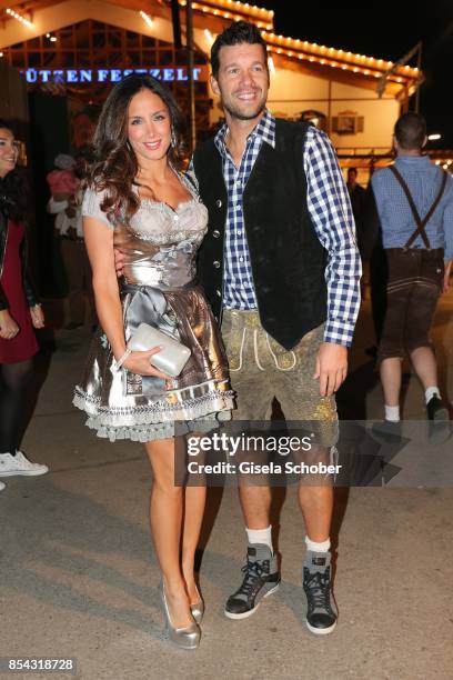 Michael Ballack and his girlfriend Natacha Tannous during the Oktoberfest at Theresienwiese on September 26, 2017 in Munich, Germany.