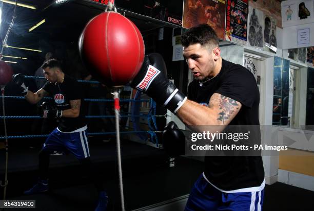 Nathan Cleverly WBO Light Heavyweight World Champion, poses for photographer during a media work out at the Stonebridge ABC, London.