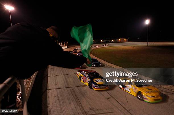 Mike David, driver of the Bennett Lane Winery Toyota, leads the pack heading into the final three laps of the NASCAR Camping World Series Race at...