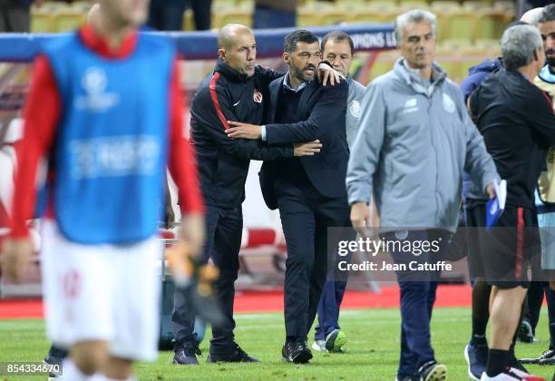 Coach of Monaco Leonardo Jardim greets coach of FC Porto Sergio Conceicao following the UEFA Champions League group G match between AS Monaco and FC...