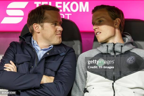 Olaf Rebbe of Wolfsburg and Yannick Gerhardt of Wolfsburg looks on during the Bundesliga match between FC Bayern Muenchen and VfL Wolfsburg at...