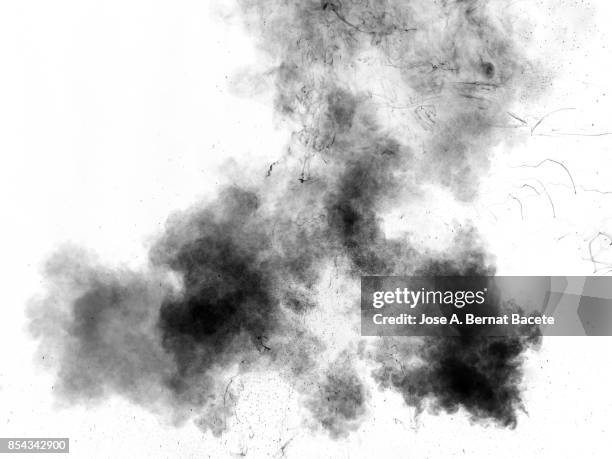 full frame of forms and figures of smoke of colors black and gray in ascending movement , on a white background - fantasma fotografías e imágenes de stock