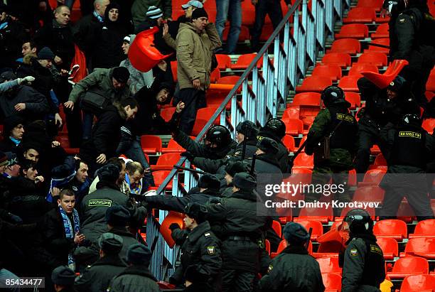 Russian police clash with Zenit Saint Petersburg fans during the Russian Football League Championship match between Spartak Moscow and Zenit at the...