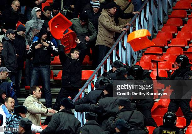 Russian police clash with Zenit Saint Petersburg fans during the Russian Football League Championship match between Spartak Moscow and Zenit at the...