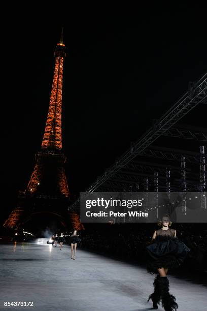 Cara Taylor walks the runway during the Saint Laurent show as part of the Paris Fashion Week Womenswear Spring/Summer 2018 on September 26, 2017 in...