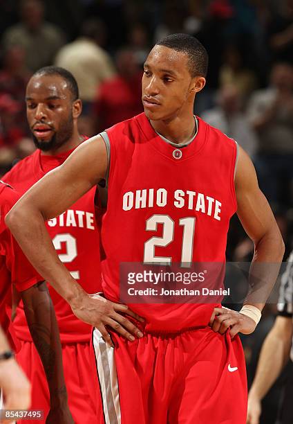 Evan Turner of the Ohio State Buckeyes looks on dejected against the Purdue Boilermakers during the final of the Big Ten Men's Basketball Tournament...