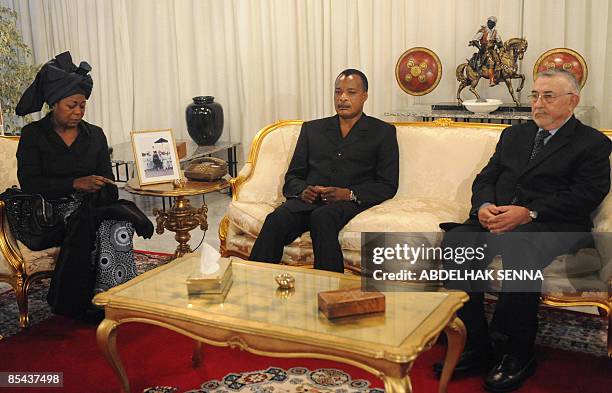 The late first lady of Gabon's father and president of Congo Denis Sassou Nguesso ,his wife and Moroccan Justice Minister Abdeouahed Radi Radi sit on...