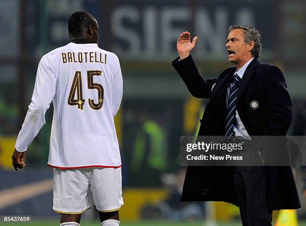 Mario Balotelli receives instruction from Jose Mourinho of Inter during the Serie A match between Inter and Fiorentina at the Meazza Stadio on March...