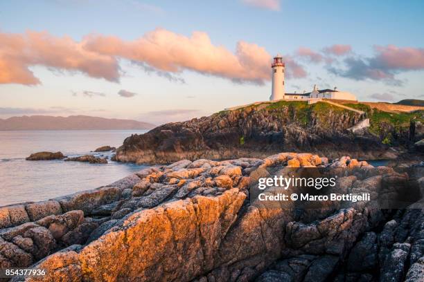 fanad head lighthouse, donega, ireland. - donega stock pictures, royalty-free photos & images