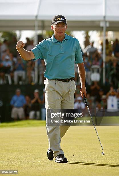 Michael Bradley sinks a birdie putt on the 18th hole during the final round of the 2009 Puerto Rico Open presented by Banco Popular at the Trump...