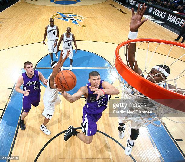 Francisco Garcia of the Sacramento Kings shoots against Andray Blatche of the Washington Wizards at the Verizon Center on March 15, 2009 in...