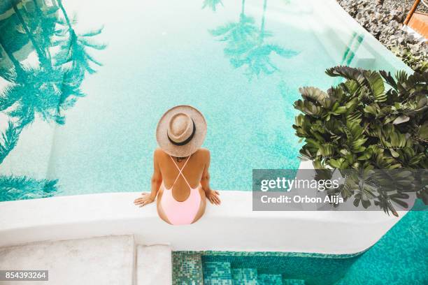 woman by the pool - beautiful greek women stock pictures, royalty-free photos & images