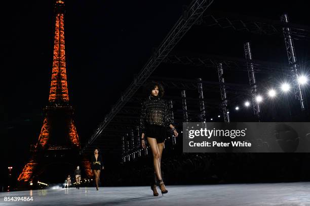 Fernanda Oliveira walks the runway during the Saint Laurent show as part of the Paris Fashion Week Womenswear Spring/Summer 2018 on September 26,...