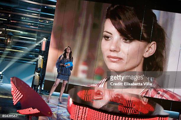 Presenter Paola Perego speaks with on live television broadcast from Brazil Giovanna Rei during `La Fattoria` Italian TV Show on March 15, 2009 in...