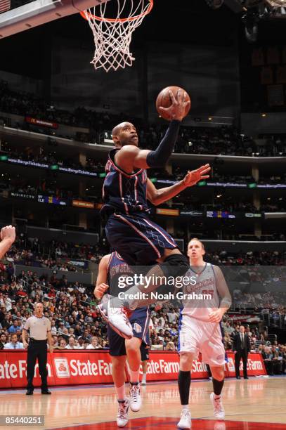 Vince Carter of the New Jersey Nets goes up for a layup against the Los Angeles Clippers at Staples Center on March 15, 2009 in Los Angeles,...