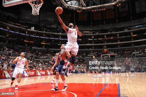 Baron Davis of the Los Angeles Clippers goes up for a layup during a game against the New Jersey Nets at Staples Center on March 15, 2009 in Los...