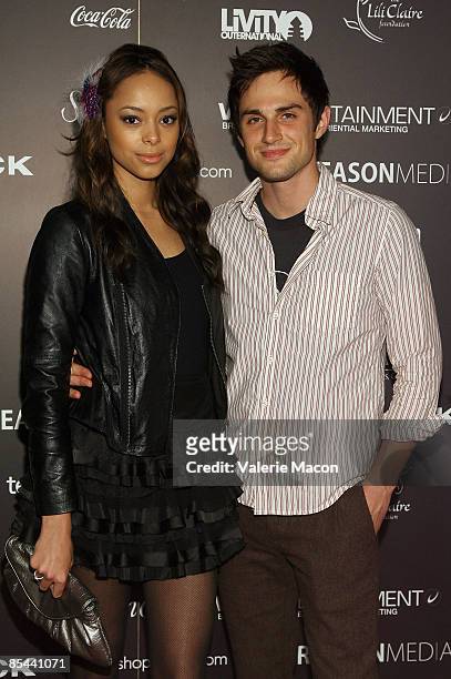 Actress Amber Stevens and actor Andrew James West attends the BOXeight Fashion week Day 3 at the Los Angeles Theater on March 15, 2009 in Los...
