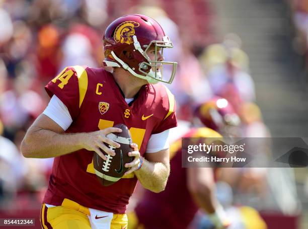 Sam Darnold of the USC Trojans prepares to pass in the pocket during the game against the Western Michigan Broncos at Los Angeles Memorial Coliseum...