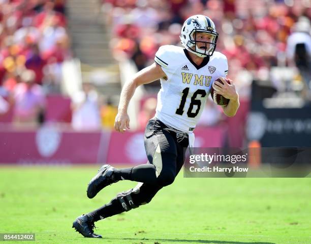 Jon Wassink of the Western Michigan Broncos runs with the ball for a first down during the first quarter against the USC Trojans at Los Angeles...