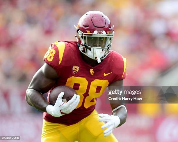 Daniel Imatorbhebhe of the USC Trojans runs after his catch against the Western Michigan Broncos at Los Angeles Memorial Coliseum on September 2,...