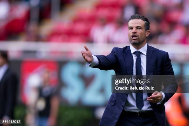 Rafael Puente coach of Lobos gives instructions to his players during the 11th round match between Chivas and Lobos BUAP as part of the Torneo...