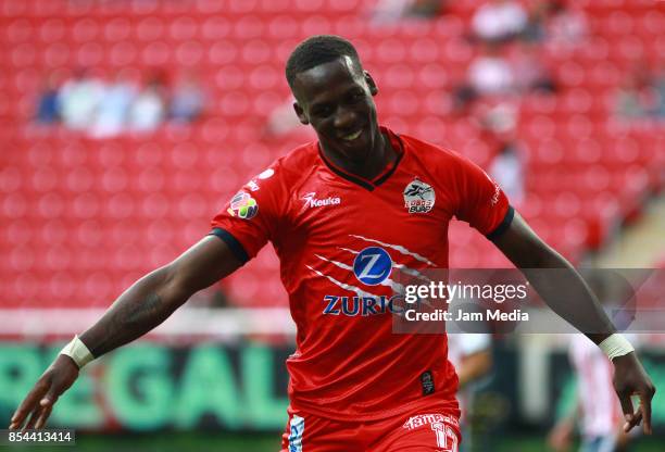 Luis Advincula of Lobos BUAP celebrates the first goal of his team during the 11th round match between Chivas and Lobos BUAP as part of the Torneo...