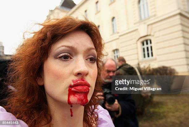 Austrian artist Iris Stromberger performs in front of the court building on March 16, 2009 in Sankt Poelten, Austria. The trial against Josef Fritzl...