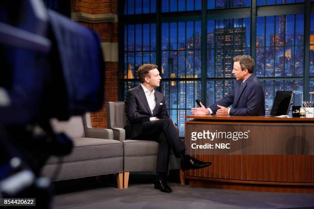 Episode 584 -- Pictured: Former White House Press Secretary Josh Earnest talks with host Seth Meyers during an interview on September 26, 2017 --