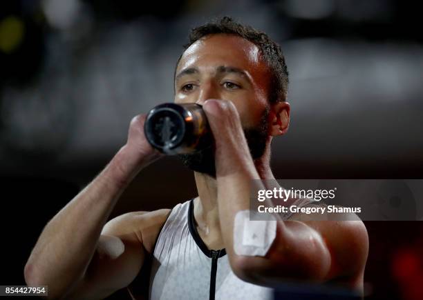 Jonathan Hamou of France drinks water after competing in the Indoor Rowing Men's IR3 Four Minute Endurance Final during the Invictus Games 2017 at...