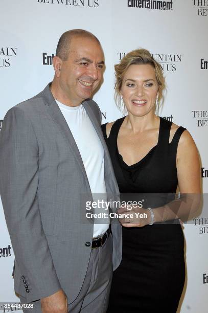 Director Hany Abu-Assad and Kate Winslet attend "The Mountain Between Us" special screening at Time Inc. Screening Room on September 26, 2017 in New...