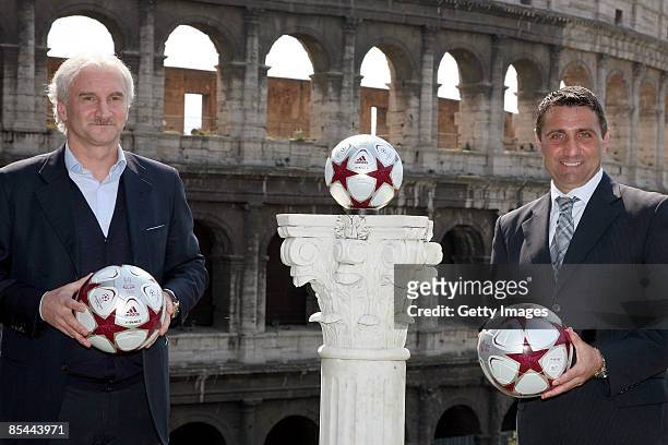 Former football players Rudi Voeller and Bruno Giordano pose with the official ball for this year's UCL Final in Rome at the Colle Oppio in front of...