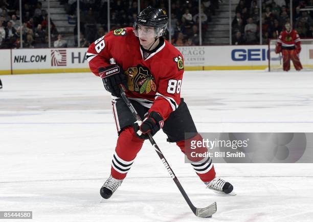 Patrick Kane of the Chicago Blackhawks waits to pass the puck during a game against the Columbus Blue Jackets on March 13, 2009 at the United Center...