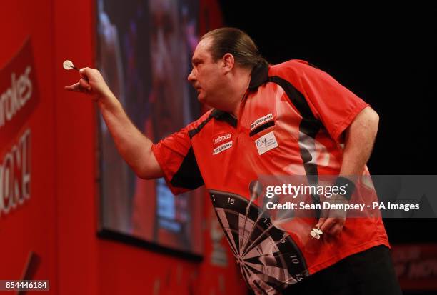 Dennis Smith during day six of The Ladbrokes World Darts Championship at Alexandra Palace, London.