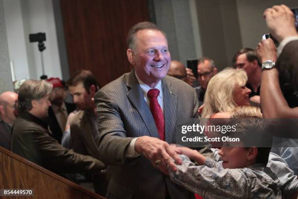 Republican candidate for the U.S. Senate in Alabama, Roy Moore greets supporters at an election-night rally on September 26, 2017 in Montgomery,...