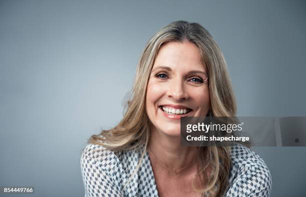her confidence just shines - mature female models stock pictures, royalty-free photos & images