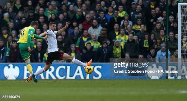 Norwich City's Gary Hooper scores his side's first goal of the game