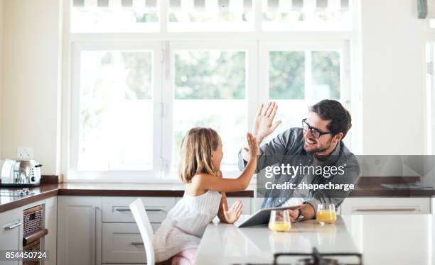 yay! you won that round! - parenting styles stock pictures, royalty-free photos & images