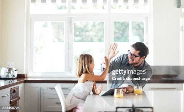 yay! you won that round! - breakfast fathers imagens e fotografias de stock