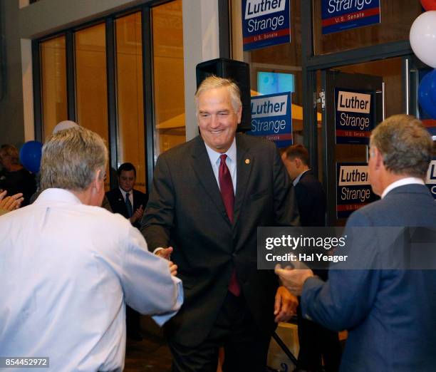 Sen. Luther Strange greets supporters as he arrives to make his concession speech after losing to Roy Moore in a GOP runoff election on September 26,...