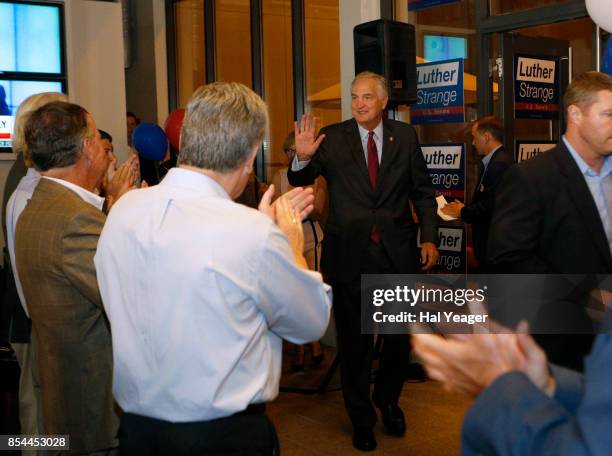 Sen. Luther Strange greets supporters as he arrives to make his concession speech after losing to Roy Moore in a GOP runoff election on September 26,...