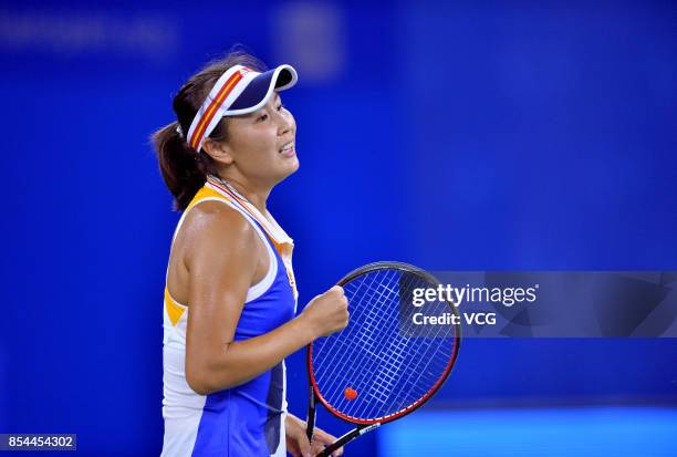 Peng Shuai of China reacts during the second round Ladies Singles match against Monica Puig of Puerto Rico on Day 3 of 2017 Dongfeng Motor Wuhan Open...