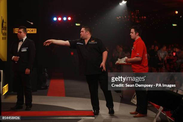 Alan Norris in action against Jan Dekker in their semi-final of the BDO World Championships at the Lakeside Complex, Surrey.