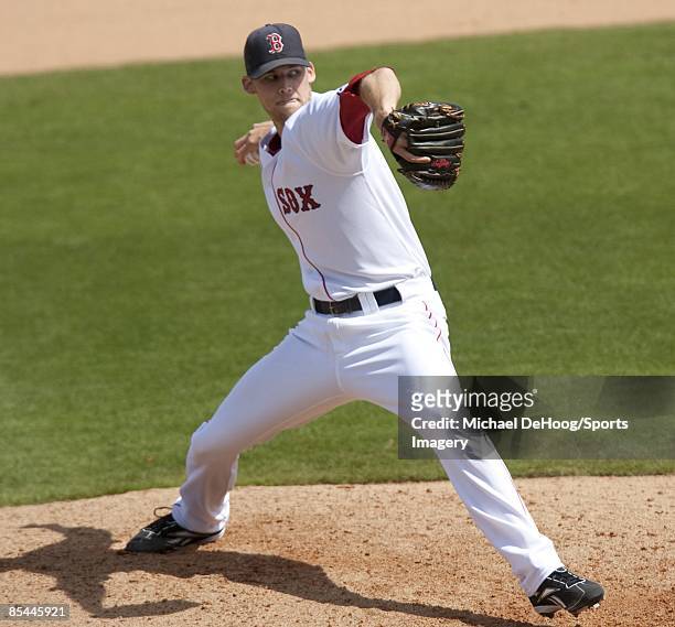 Pitcher Daniel Bard of the Boston Red Sox pitches against the Tampa Bay Rays during a spring training game at City of Palms Park on March 8, 2009 in...