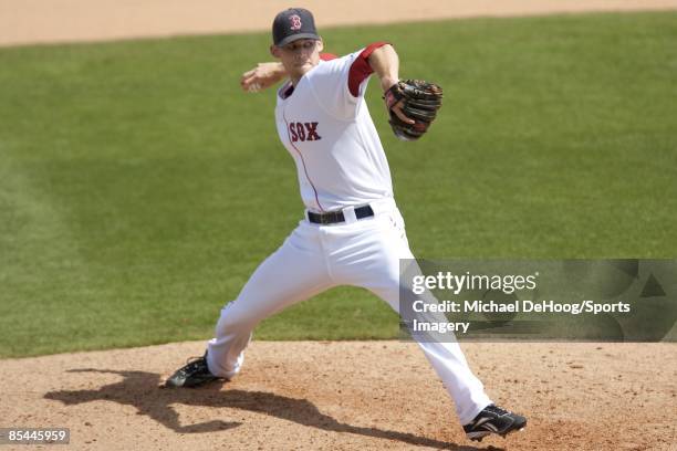 Pitcher Daniel Bard of the Boston Red Sox pitches against the Tampa Bay Rays during a spring training game at City of Palms Park on March 8, 2009 in...