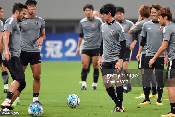 Players of Urawa Red Diamonds attend a training session ahead of 2017 AFC Champions League semifinal first leg match between Shanghai SIPG and Urawa...