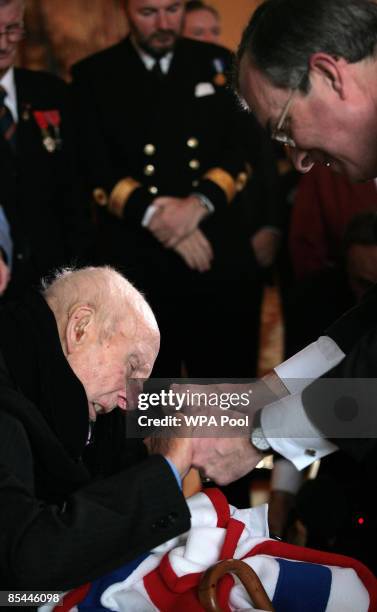 Henry Allingham appears emotional as he is promoted to the rank of Officier de la Legion d'Honneur by the French Ambassador Maurice...