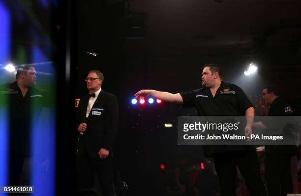 Alan Norris throws during the BDO World Championships Final at the Lakeside Complex, Surrey.