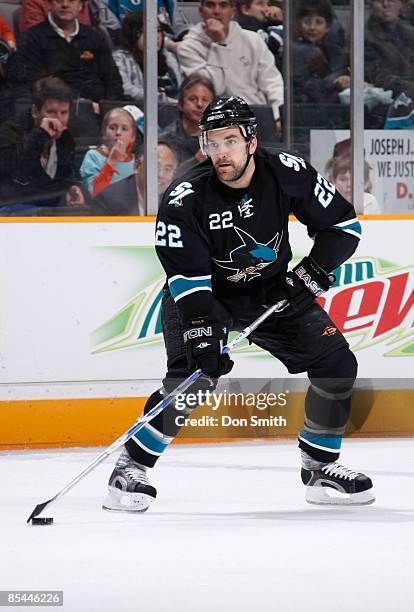 Dan Boyle of the San Jose Sharks looks for a teammate to pass the puch to during a NHL game against the Minnesota Wild on March 5, 2009 at HP...