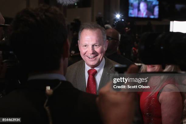 Republican candidate for the U.S. Senate in Alabama, Roy Moore speaks to reporters at an election-night rally after declaring victory on September...