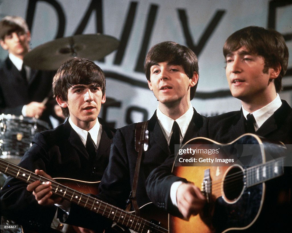 George Harrison Rip The Beatles perform in November 1963. 58 year old ex-Beatle band ...